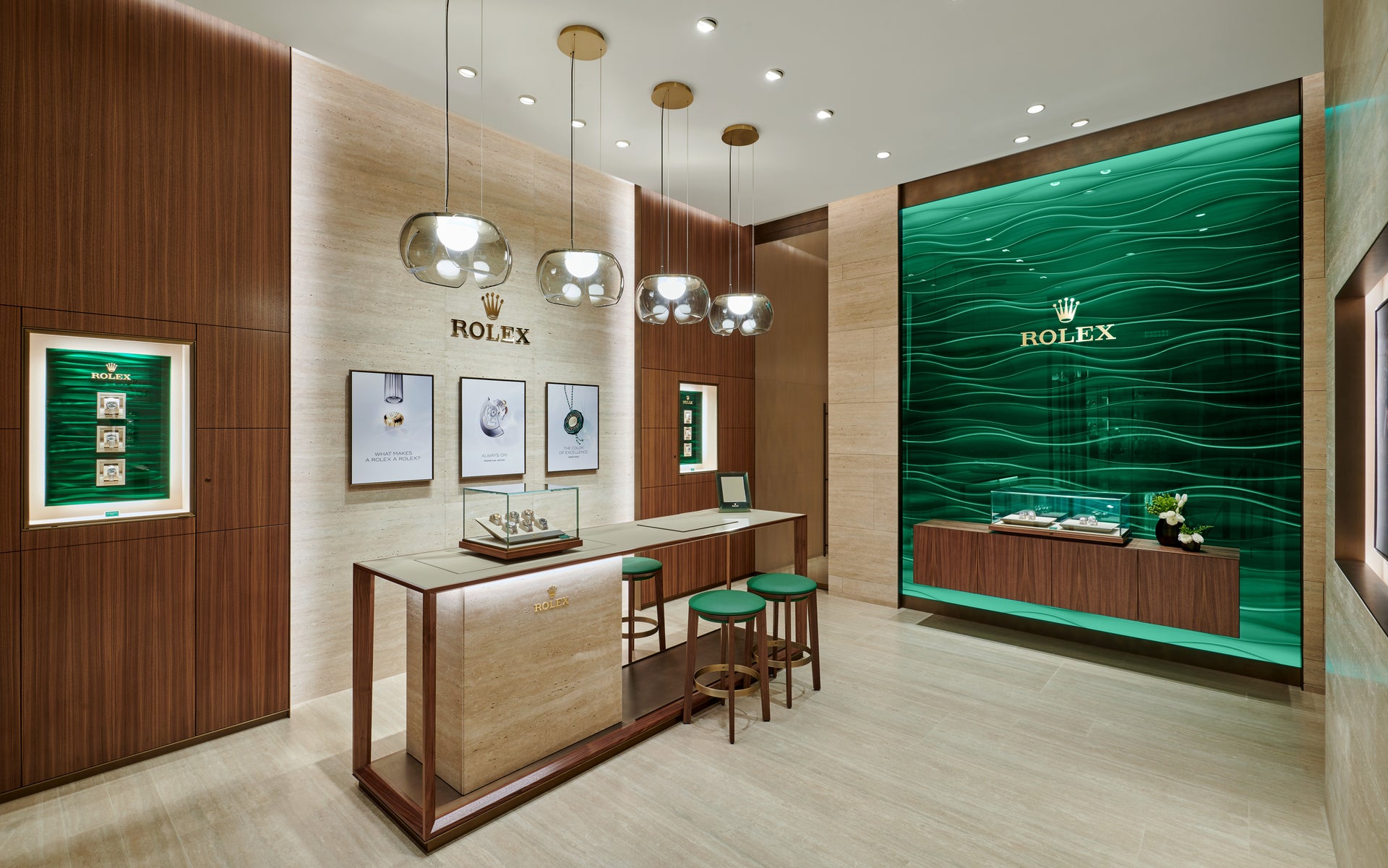 Rolex Boutique Detroit luxurious front room with watch bar and stools and drop lighting