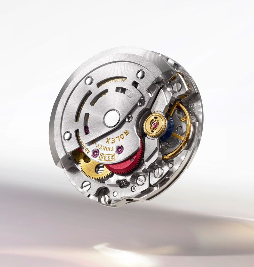 The image shows a close-up of the Rolex Datejust 2236 movement, highlighting its precise engineering and craftsmanship