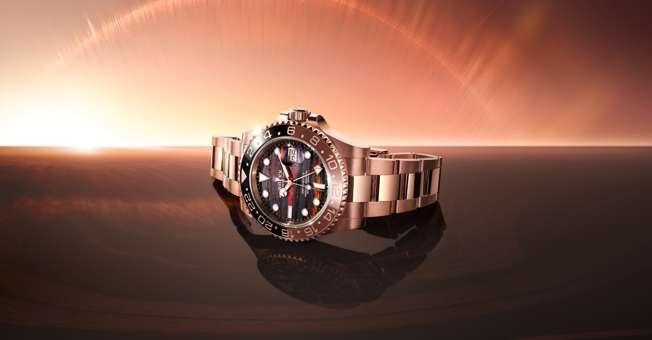 The image shows a 2025 Rolex GMT-Master II with a black and red bezel and detailed dial.