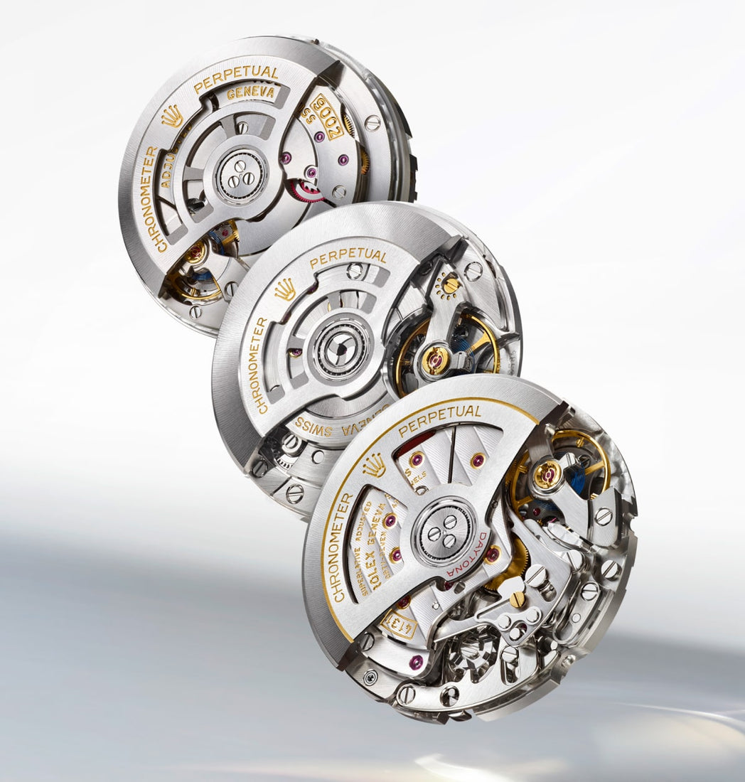 Three Rolex watch movements with exposed mechanical components, featuring silver and gold finishes with PERPETUAL and CHRONOMETER engravings, displaying intricate gears, springs, and jeweled bearings against a clean white background.