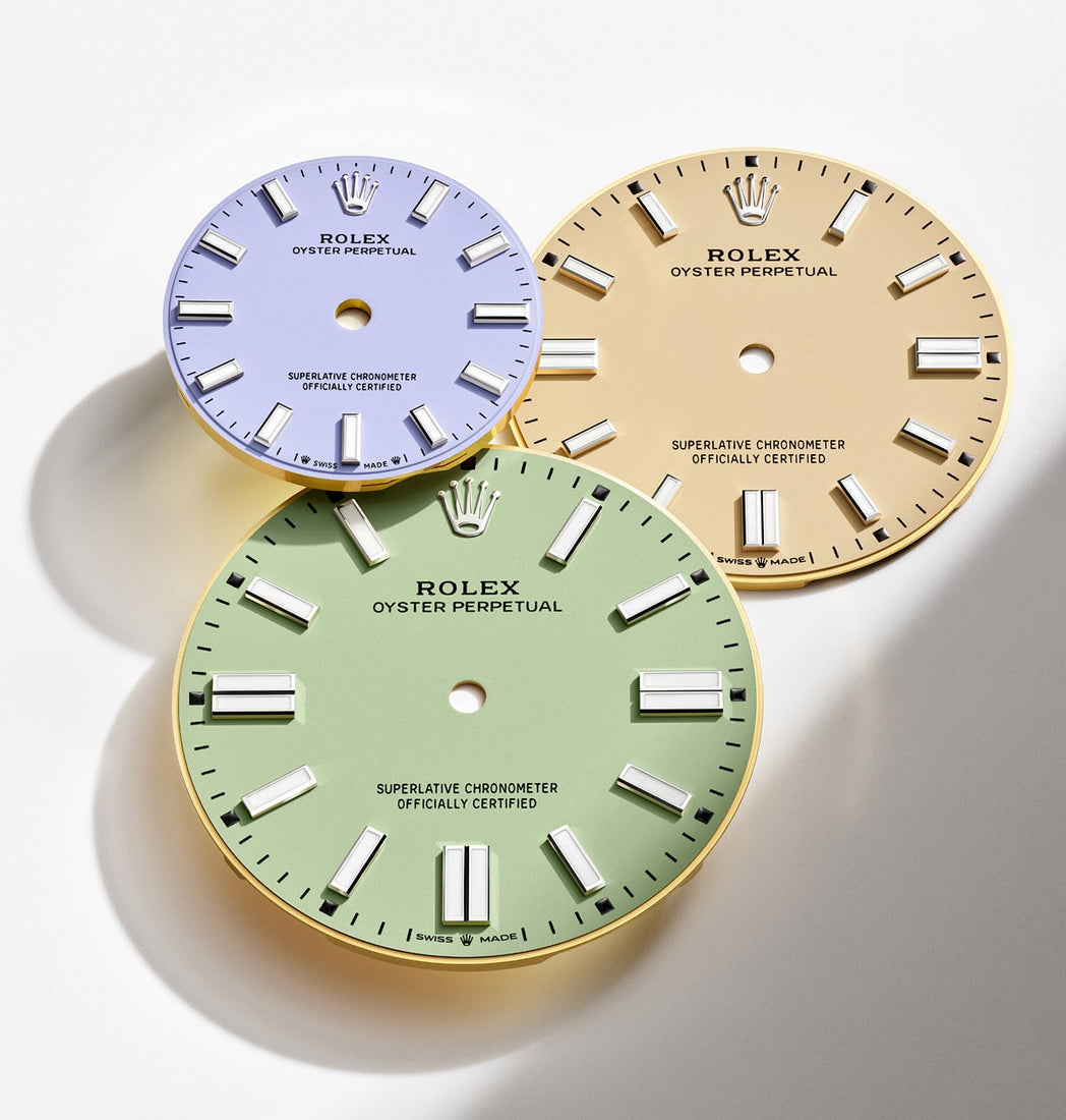 Rolex Oyster Perpetual watch showcasing a distinctive dial design for 2025, with a sleek and modern aesthetic set against a blurred dark background.