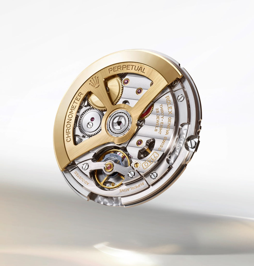 Close-up image of the intricate internal movement of a Rolex watch, showcasing the Perpetual 1908 7140 mechanical components in detailed craftsmanship.